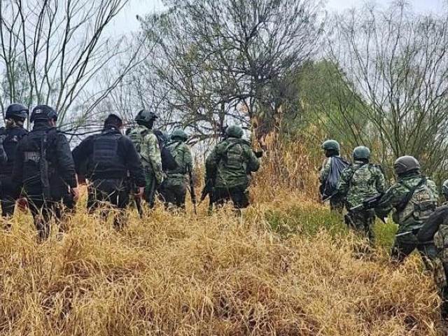 Mexican State Police officers search an island for cartel gunmen who fired on U.S. Border Patrol agents. (PHOTO: Cartel Chronicles/Breitbart Texas)