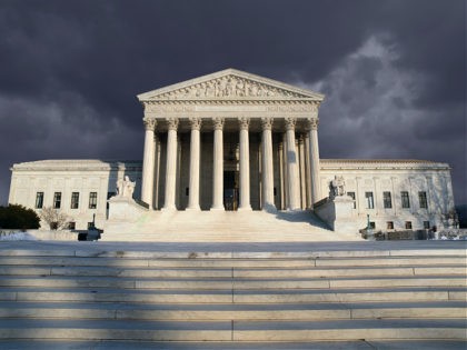 Dark forbidding troubled storm sky over the United States Supreme Court building in Washin